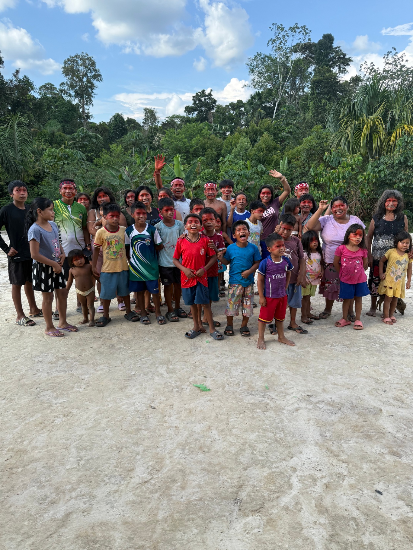 Community gathering with indigenous tribe at Kambo ceremony