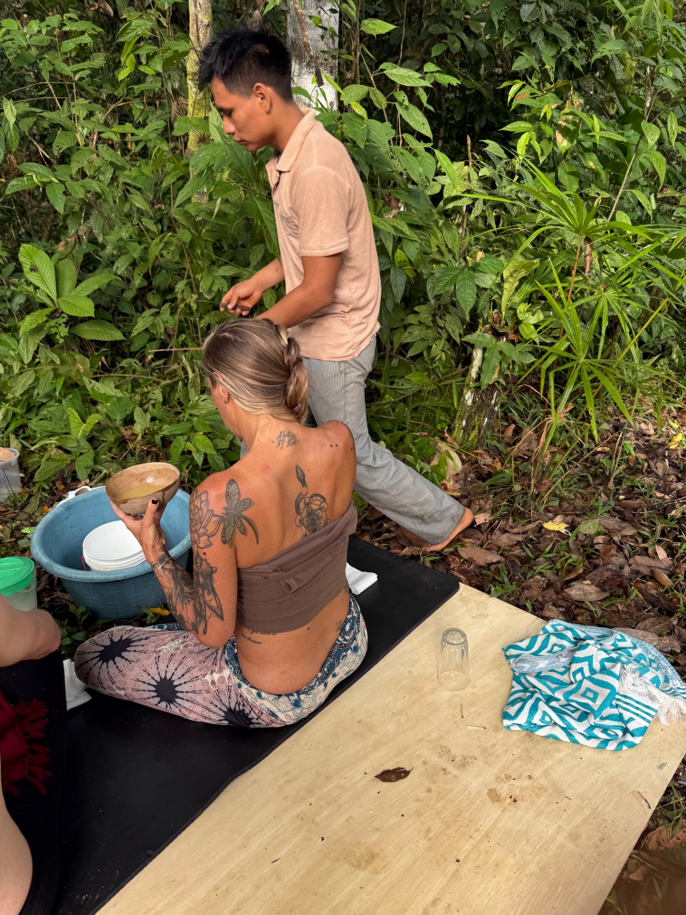 Kambo ceremony participant in meditation